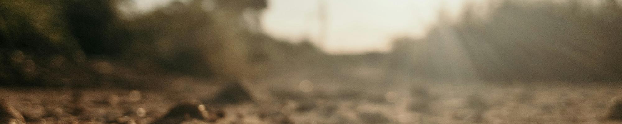 Brown soil under white sky during day time
